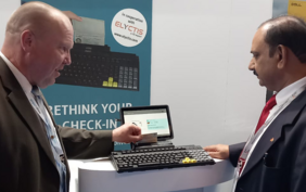 Michael Seidler shows a check-in solution at the airport show