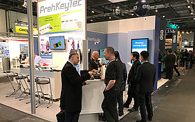 Visitors at the PrehKeyTec booth